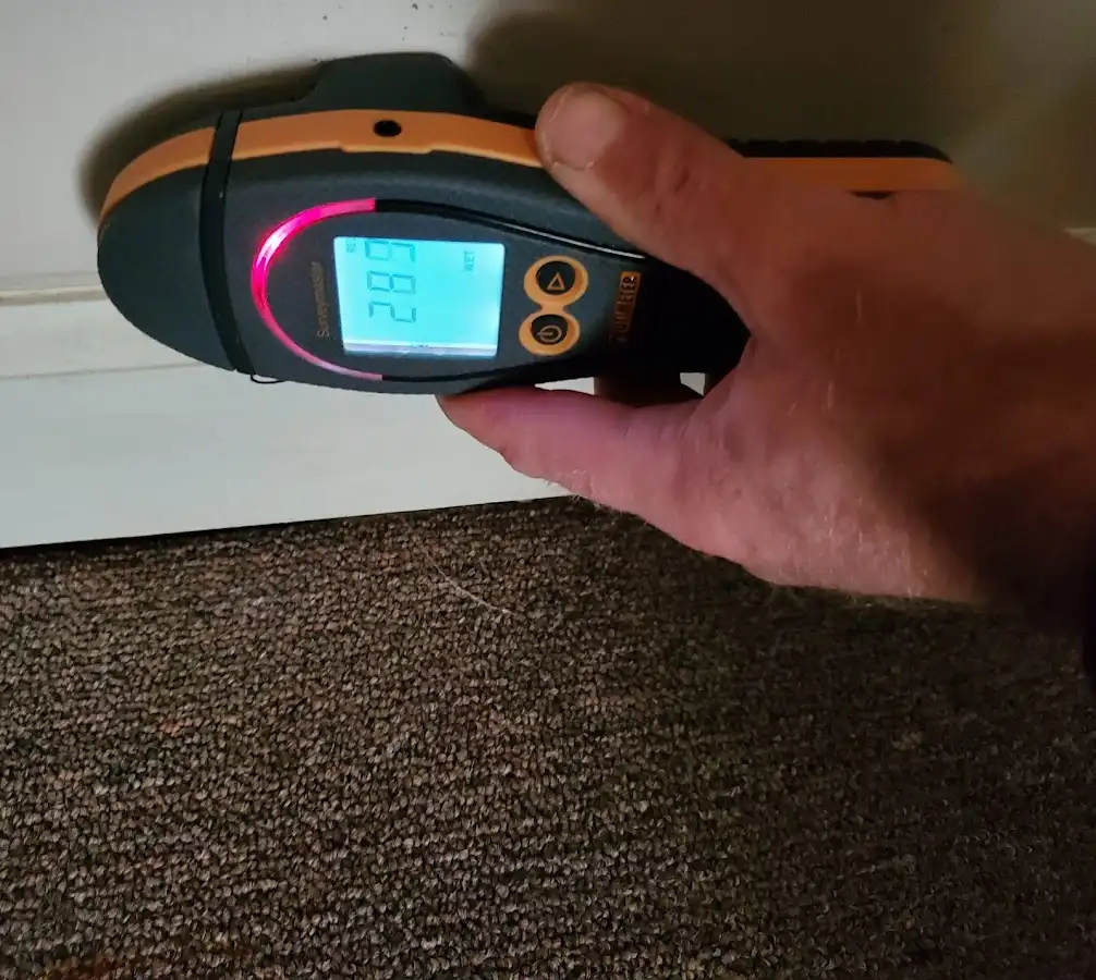 Moisture detection at baseboard during Storm Damage Restoration in North Whitehall